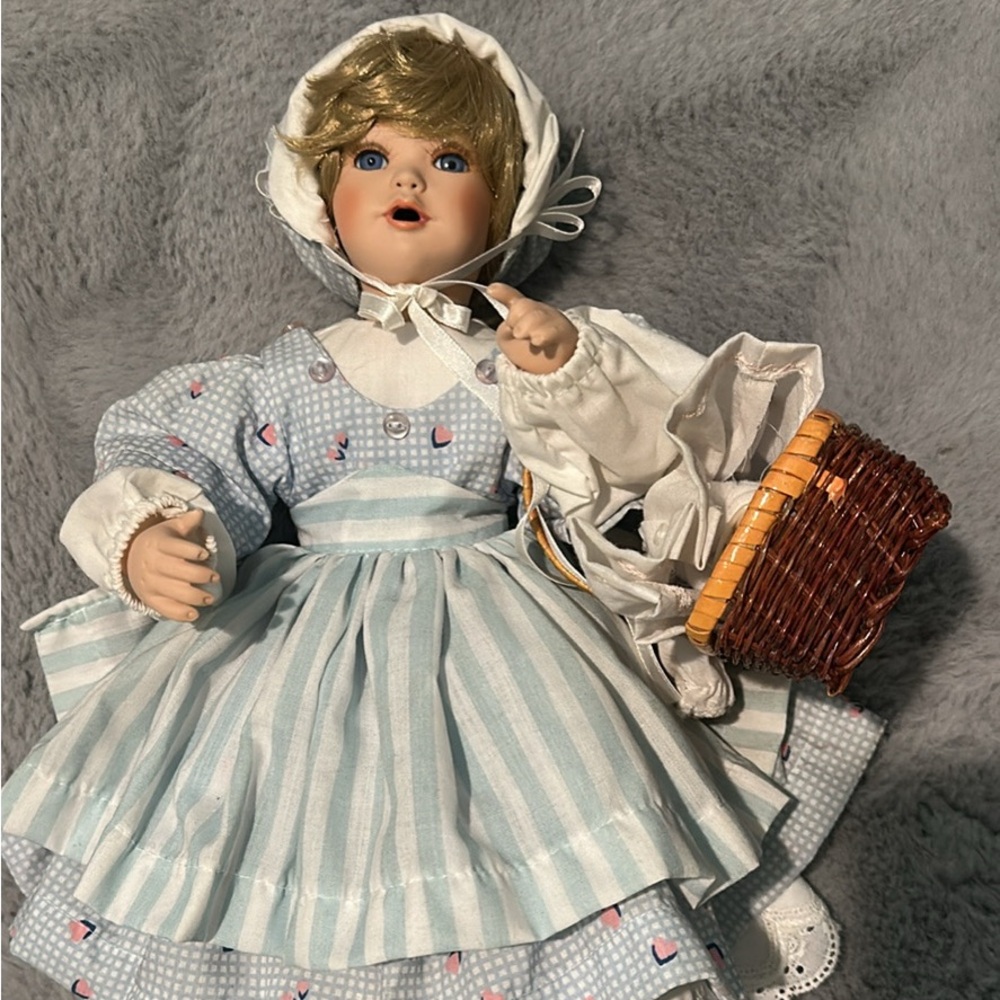 Vintage Style Porcelain Doll with Blue Dress